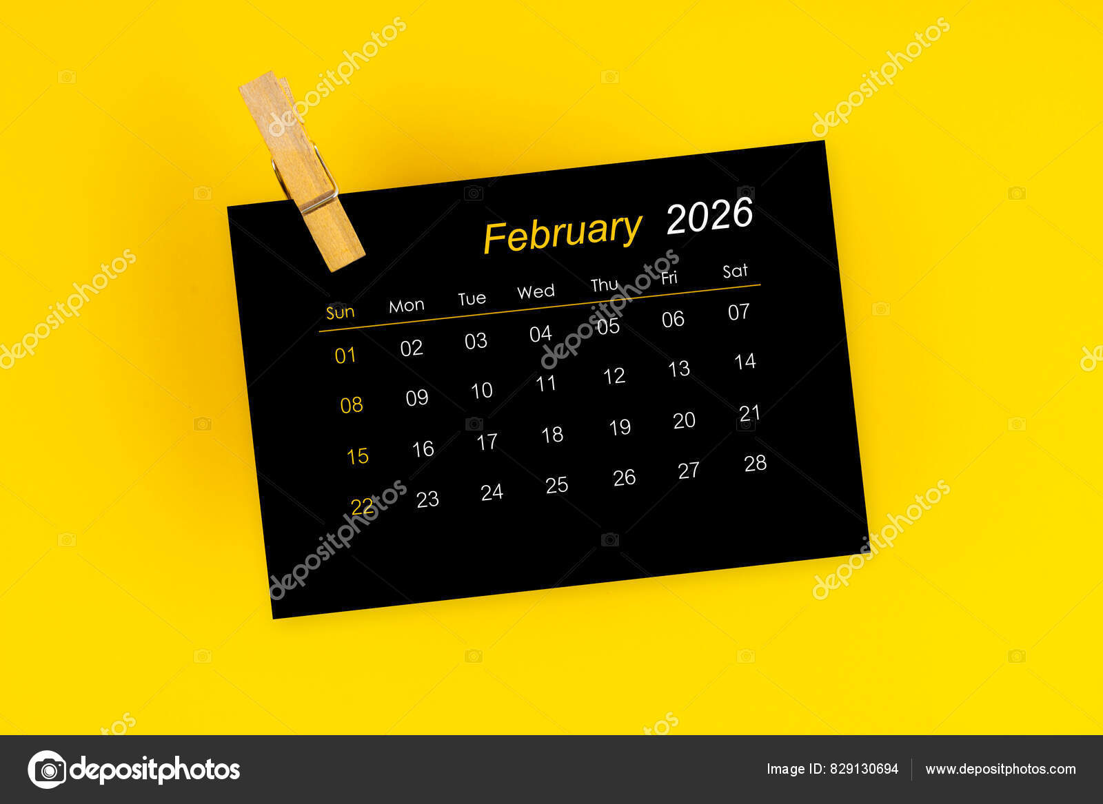 February 2026 Black Calendar Wooden Clip Yellow Background — Stock for February 2026 Calendar Black Background